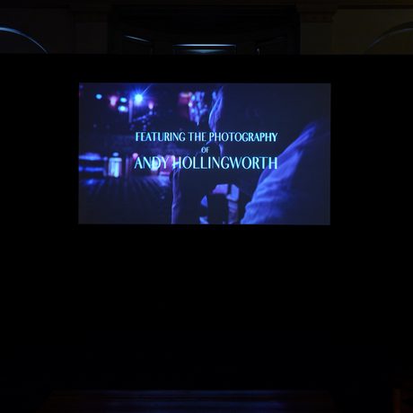 Film credits showing "Featuring the photography of Andy Hollingworth" on a dark background.