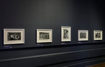 Row of black and white photos.