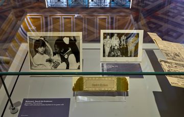 A selection of black and white photographs on display.