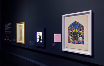 Stained glass, print and artwork on display.