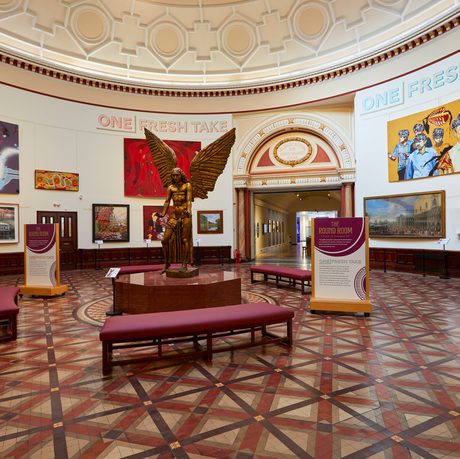 A view the Round Room with a statue of Lucifer by Sir Jacob Epstein in the centre surrounded by paintings..