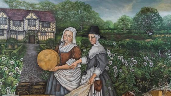 A painting of two Tudor women in the gardens at Blakesley Hall.