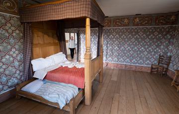 An historic Tudor bedroom with 4 poster bed.