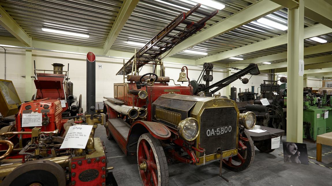 Storage area containing vintage motorised fire engines
