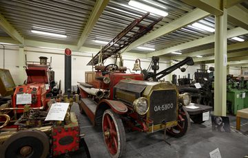 Storage area containing vintage motorised fire engines