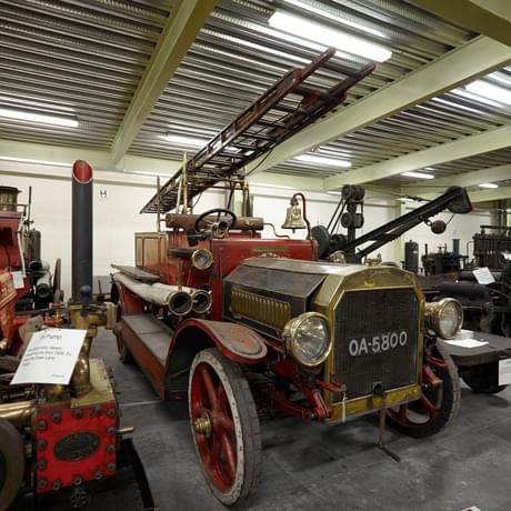 Storage area containing vintage motorised fire engines