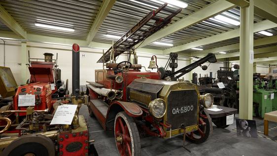 Storage area containing vintage motorised fire engines