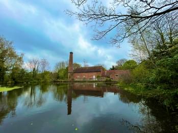 Sarehole Mill and with pond in front.