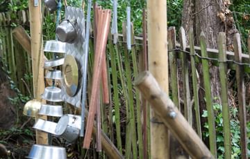 Saucepans and chime interactive hanging in the woodland realm.