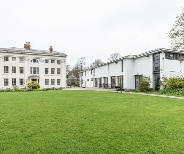 Wide view of Soho House and visitor centre building