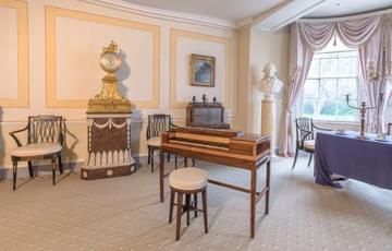 18th century music room with piano