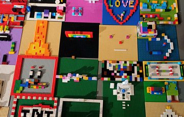 A variety of LEGO baseplates with lego designs on them.