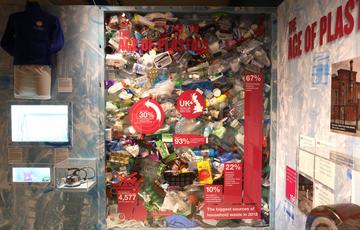 A wall of plastic items showing what we throw away.