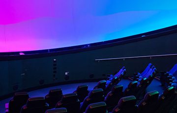 Seats in an empty planaterium.