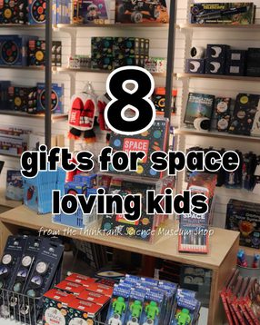 Items in a shop on shelves with the caption '8 gifts for space loving kids from Thinktank'.