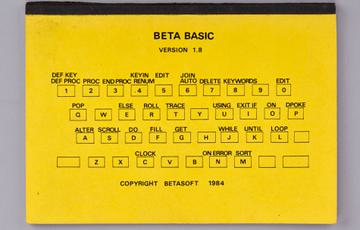 A yellow instruction manual for BETA BASIC version 1.8.