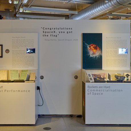Two display cases of objects.