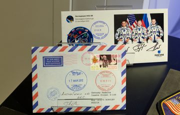A letter and signed photo on display.
