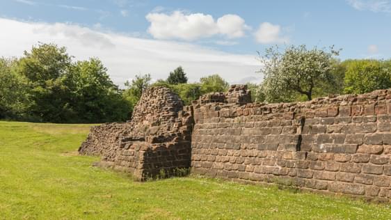 Stone ruins of a corner of the castle walls