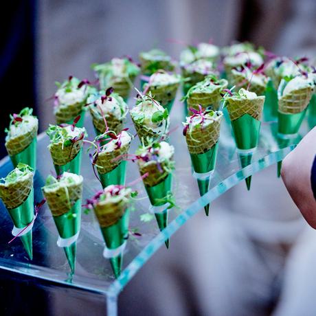 Cones of food in an holder.